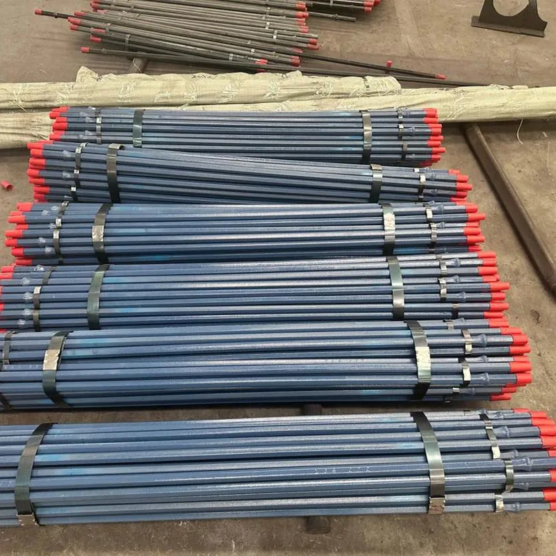 Top hammer drill rod